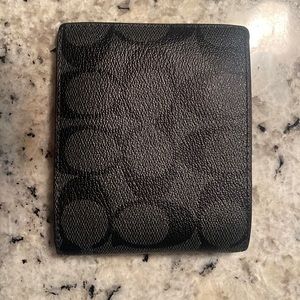 Black coach wallet.